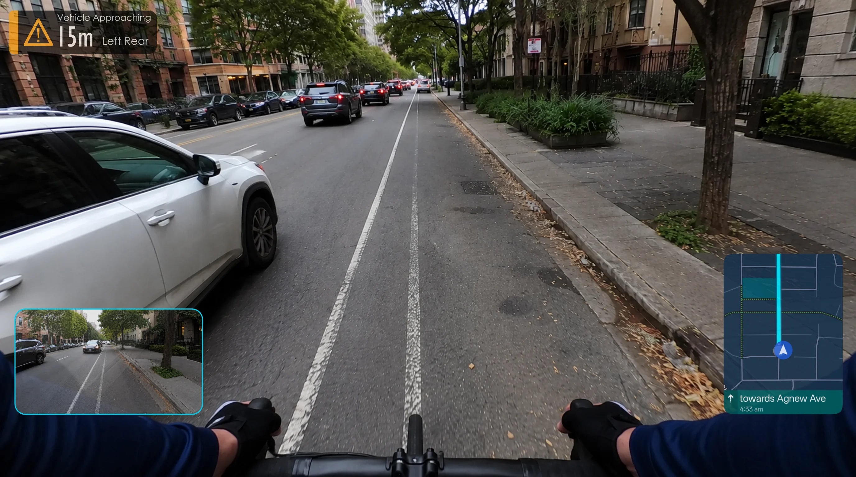 Vyzor heads-up display showing rear view, vehicle alert, and navigation information together