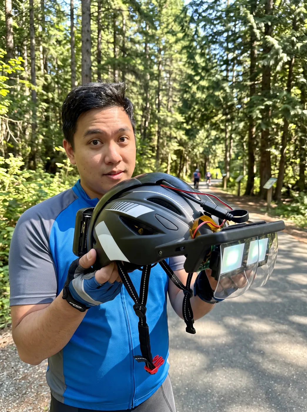 Henry holding a Vyzor prototype